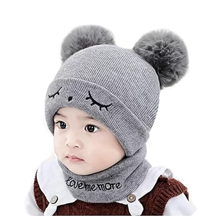 a baby wearing a grey beanie hat and scarf set perfect for winters from TENDSY