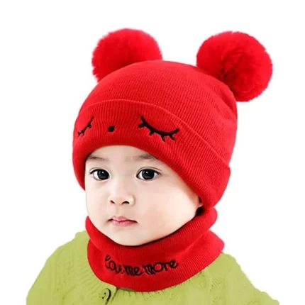 a baby wearing a red beanie hat and scarf set perfect for winters from TENDSY